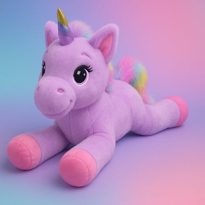 Plush unicorn toy with a pastel-colored horn and rainbow tail on a gradient background